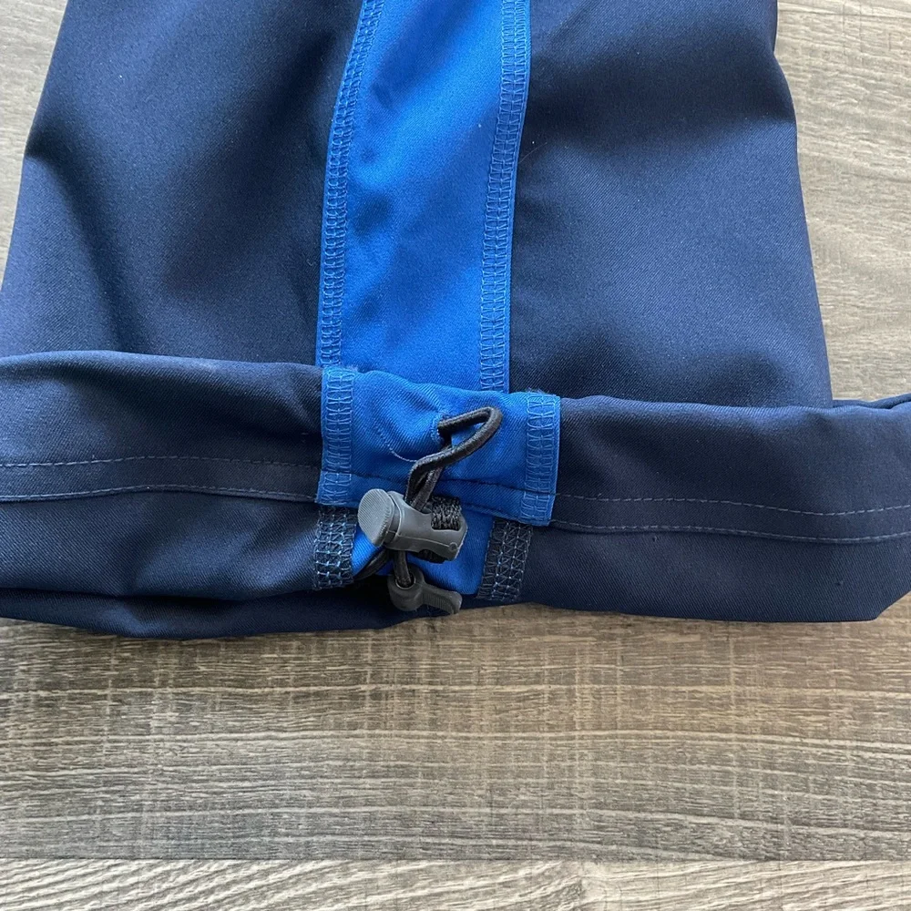 NWT Nike Team Woven Dri Fit Training Pants Men’s MEDIUM Blue Cord Hem 377786-451